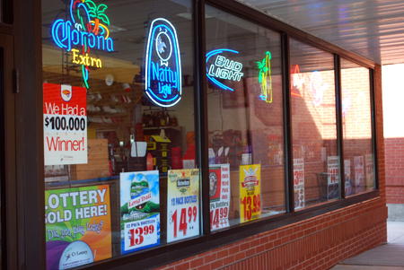 Clean and bright storefront of Bombadil's Spirit Shop in Mansfield Center, CT